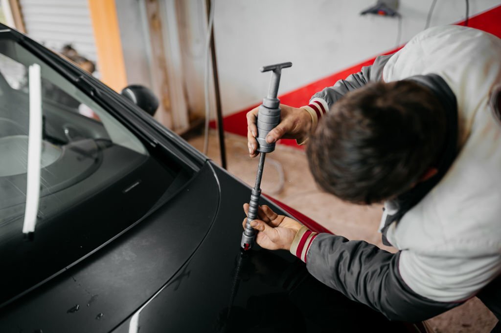 Unveiling the Magic: How Paintless Dent Repair Makes Car Imperfections Disappear